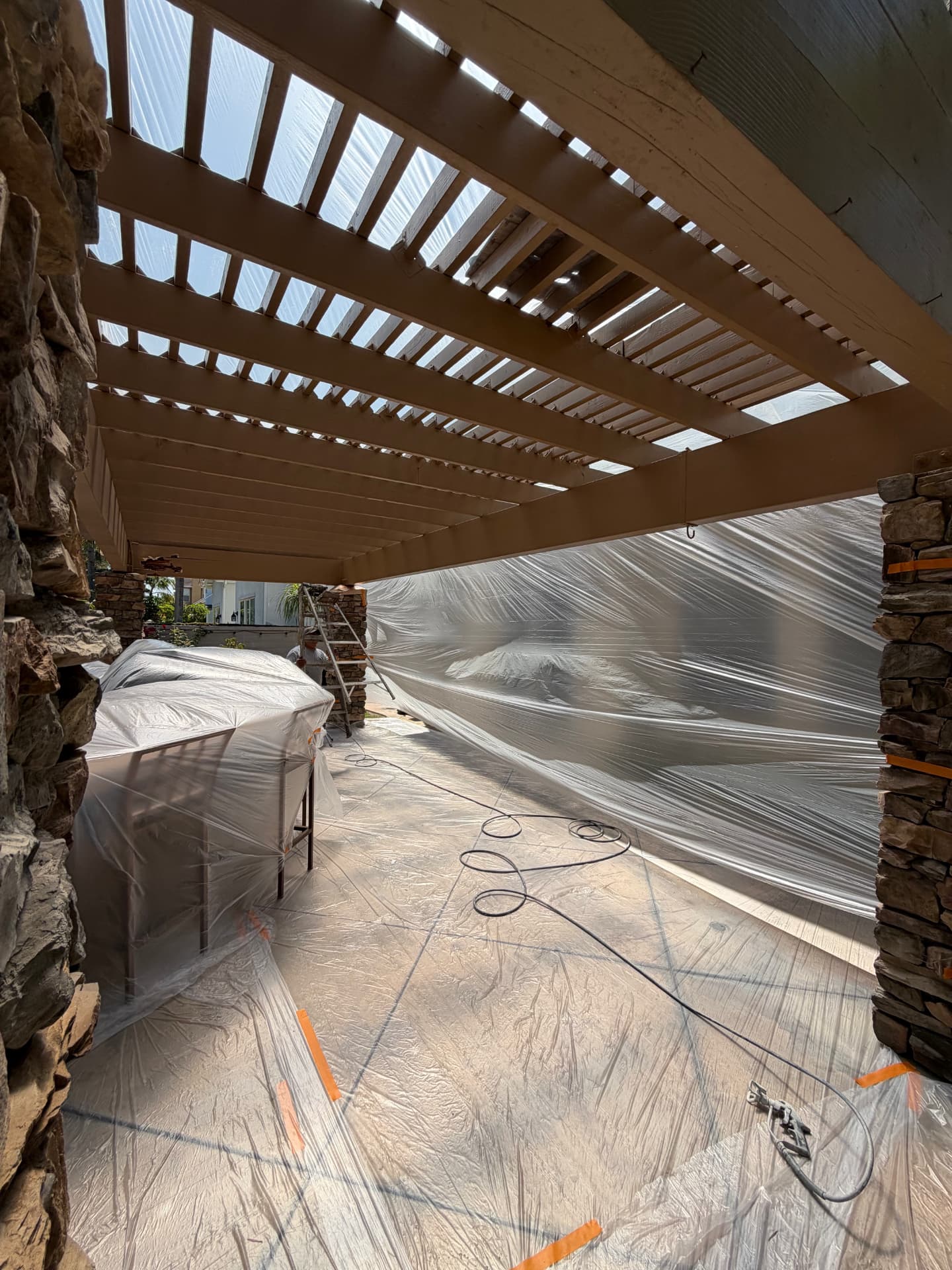 Pergola Refinish in Progress in California, USA by CHRETE Home & Construction