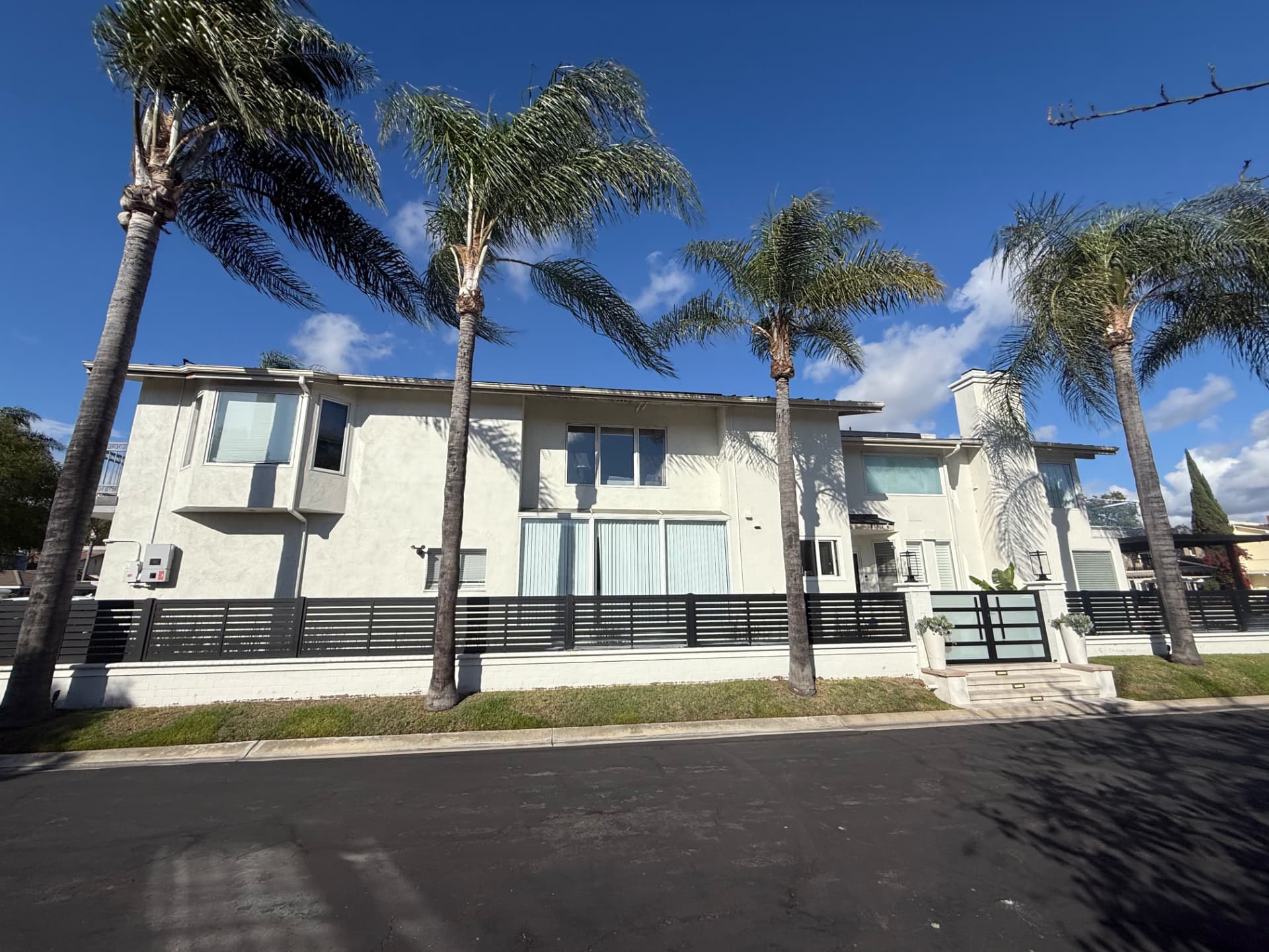 Stucco & Fence Refresh — before